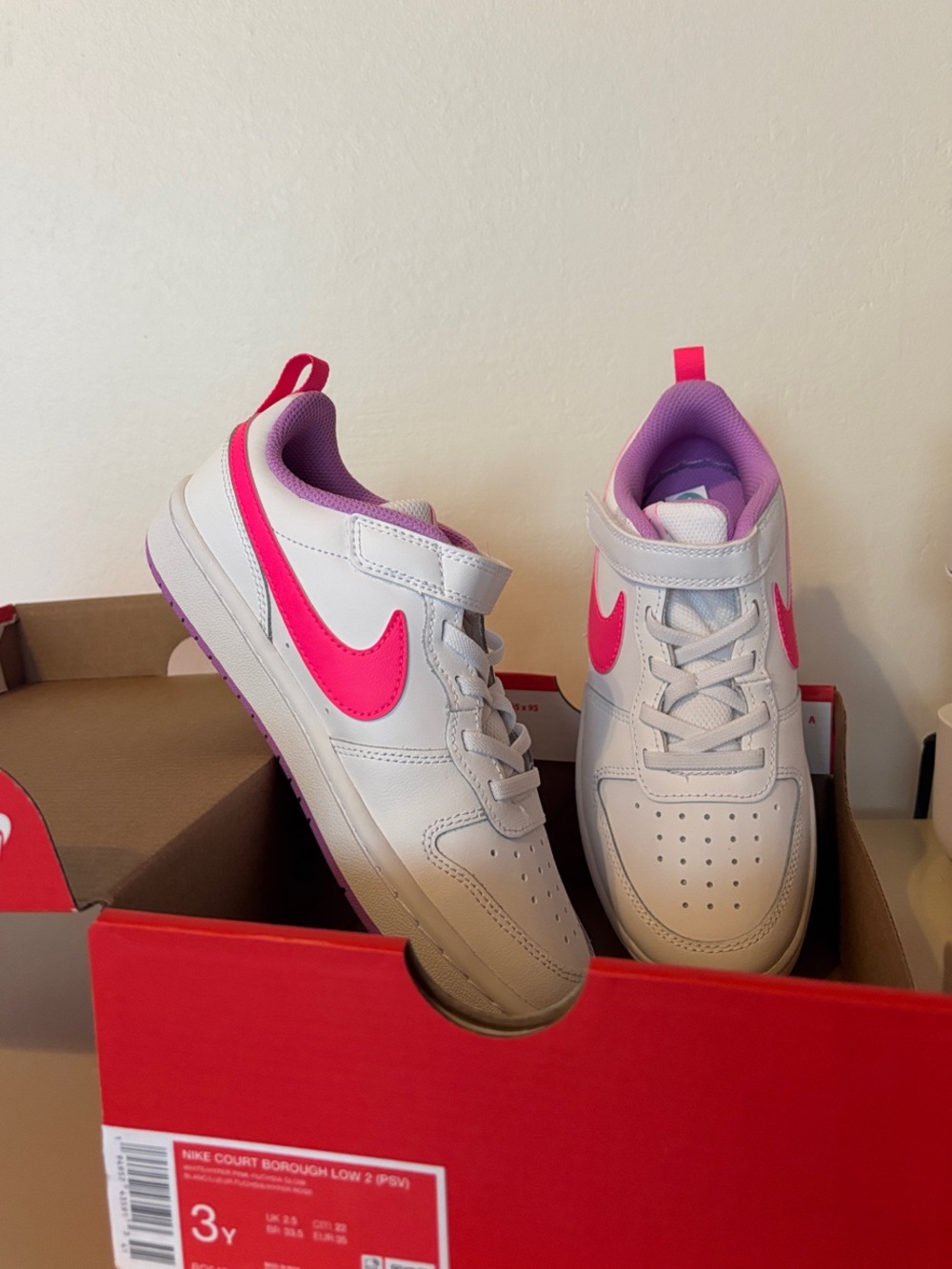 Nike Kids White Sneakers with Hot Pink Swoosh
